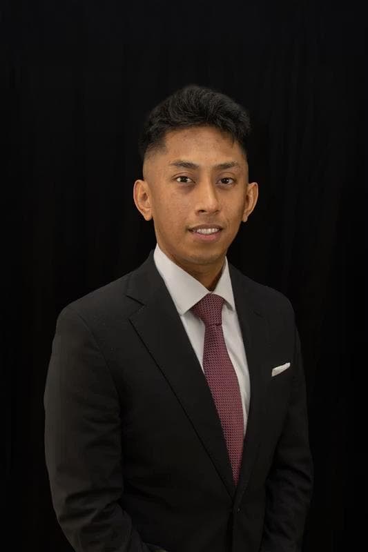 Headshot of Arnole Santos, Catering Manager
